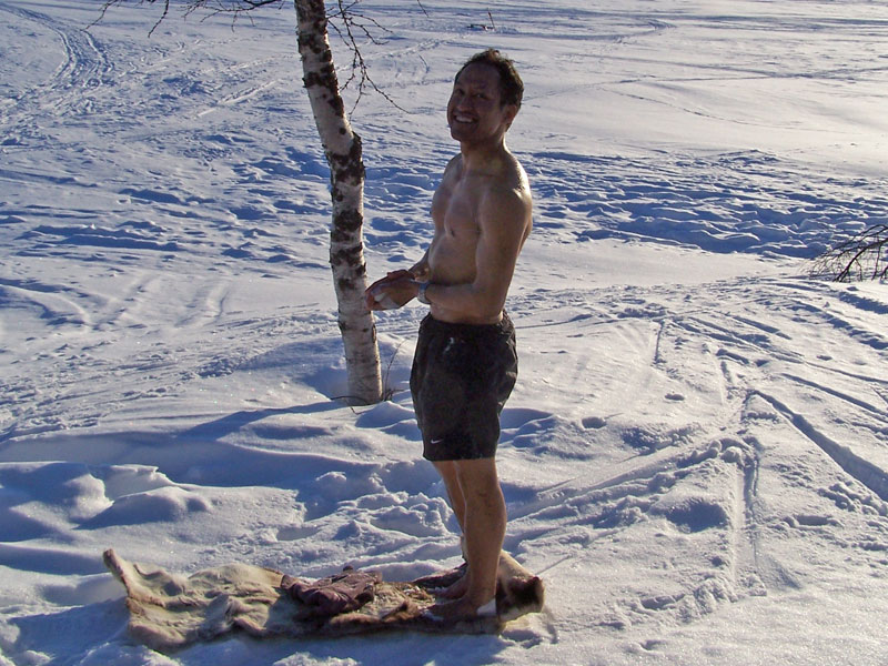 Cold? It's not cold! Petter braves the Arctic air for a wash. Photo: Nature Travels.