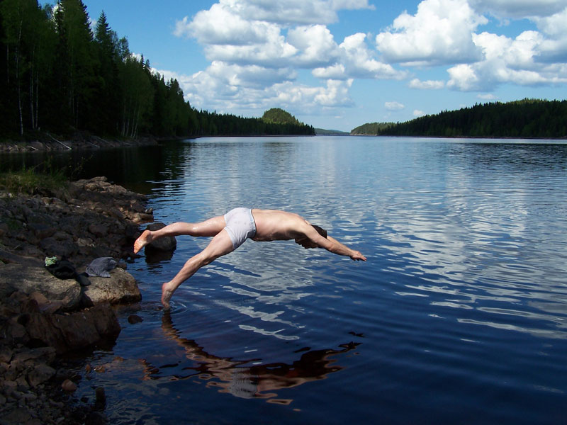 Craig takes the plunge, despite the lack of formal swimwear. Photo: Bob Nature Travels.