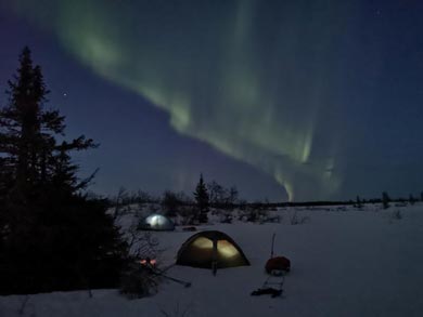 Aurora over the camp | Photo: ET