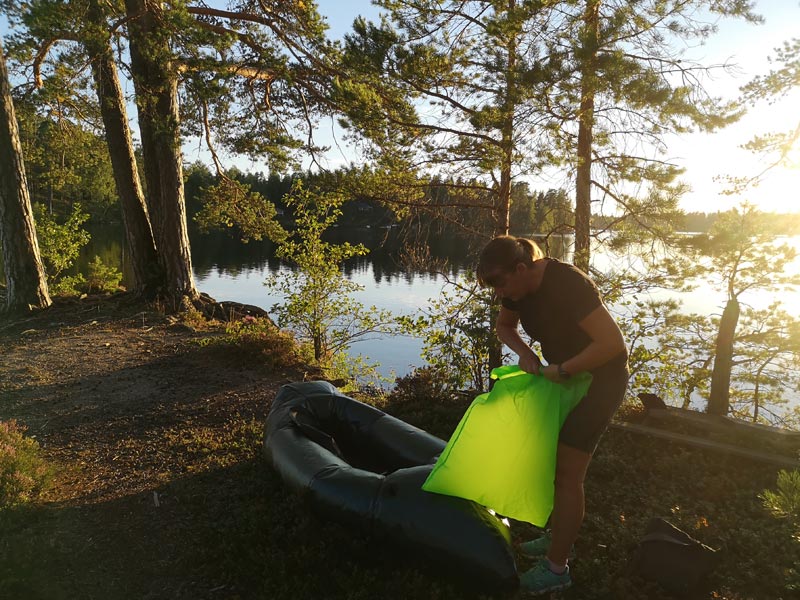 Inflating a packrafting in Tiveden