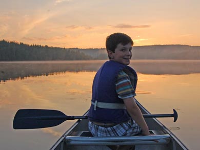 Evening canoeing on the lake | Photo: Laura Stacey