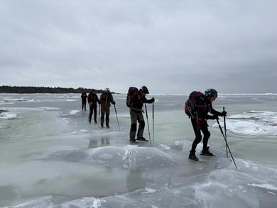 Testing the ice thickness before moving on safely | Photo: SA