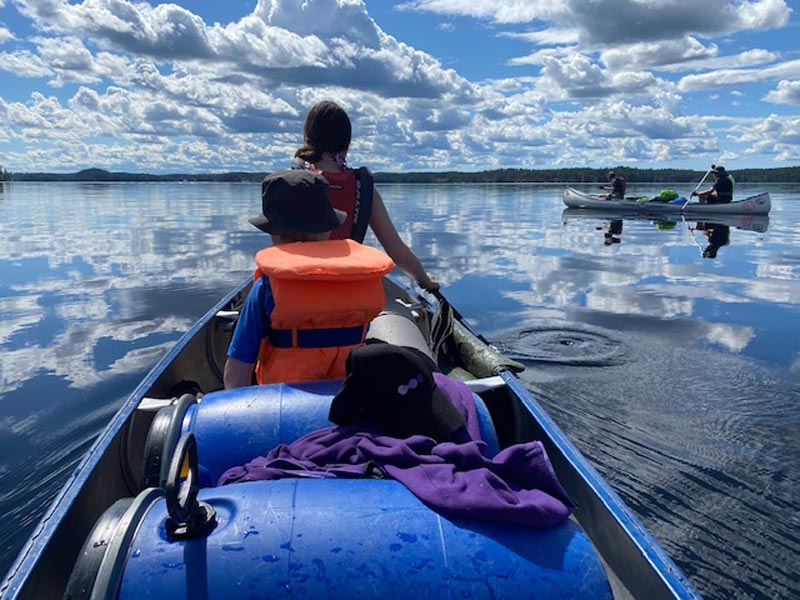 Family canoeing in Dalsland