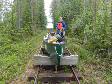 Using the canoe rails for land transports | Photo: Nature Travels